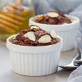 Chocolate dessert in white ramekin bowl