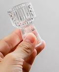 Hand showcasing detailed Mini Measure Shot Glass design