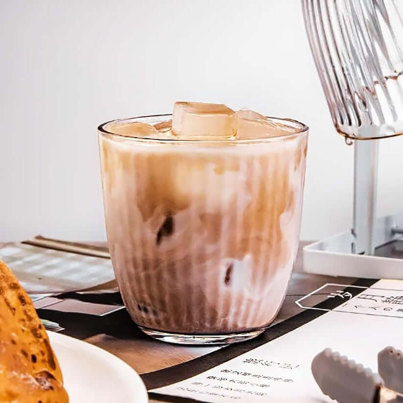 Iced coffee served in a Retro Striped Glass Cup