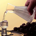 Holding a tray of carafe and Mini Measure Shot Glass