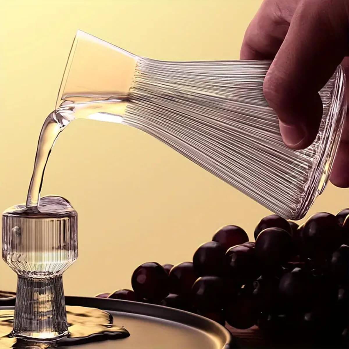 Holding a tray of carafe and Mini Measure Shot Glass