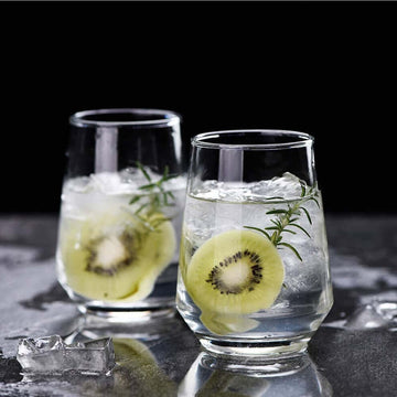 Oval Shape Whiskey Glass filled with kiwi ice drink