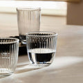 Glass filled with water in a Textured Glass Tumbler