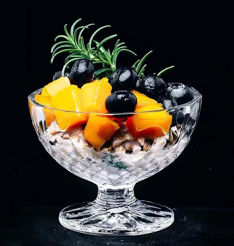 Fruit and nut mix served in a pedestal dessert bowl
