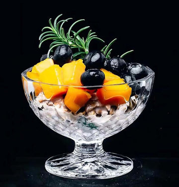 Fruit and nut mix served in a pedestal dessert bowl
