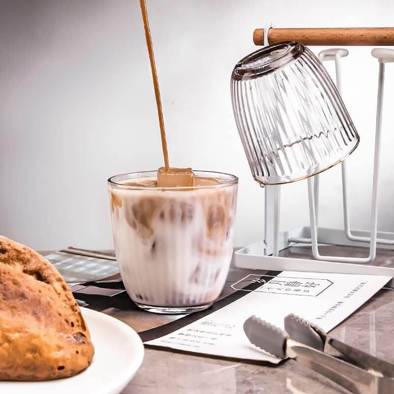 Textured Glass Tumbler with iced coffee and bread