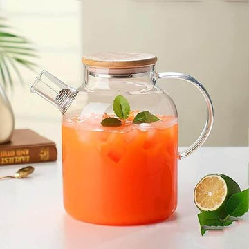 Glass Water Pitcher filled with orange mint cooler