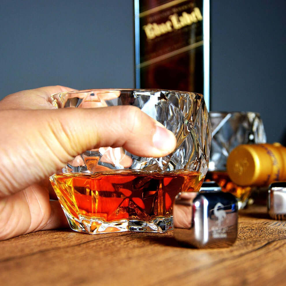 Classic table setting with Diamond Shaped Crystal Whiskey Glass beside whiskey stones