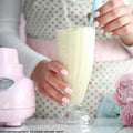 Chilled dessert trio topped with cream in Cocktail Falooda Milkshake Glass