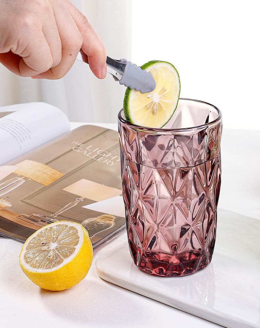 Refreshing drink served in Diamond-Cut Pink Glass tumbler
